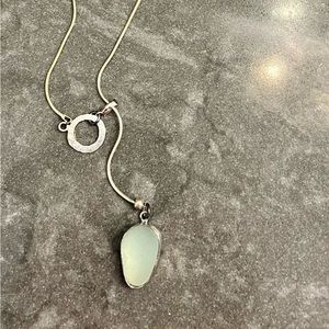 Green sea glass necklace. Silver chain can be worn long or lariat style.